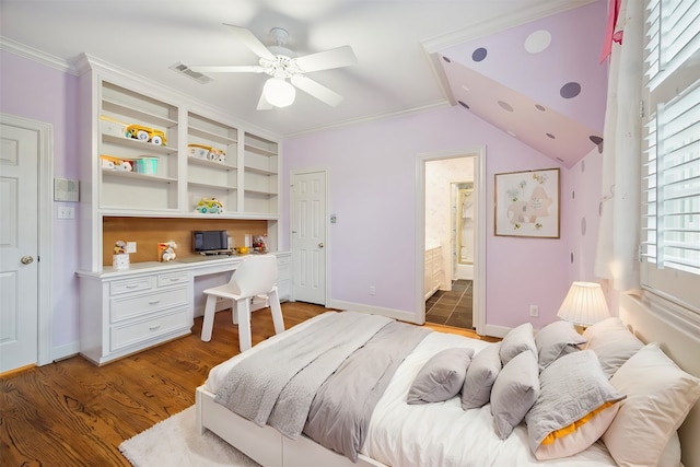 bedroom featuring lofted ceiling, crown molding, ensuite bath, ceiling fan, and wood-type flooring