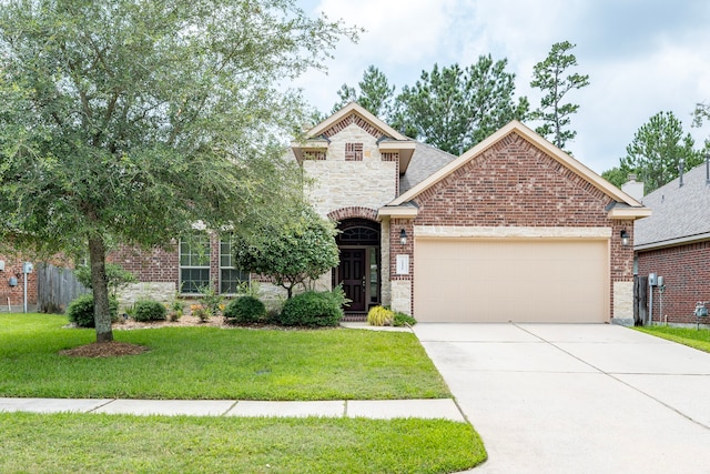 view of front facade featuring a front lawn and a garage