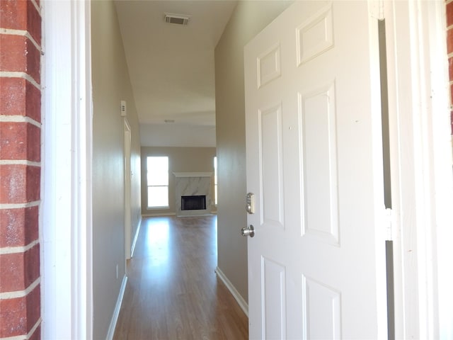 hallway featuring dark wood-type flooring