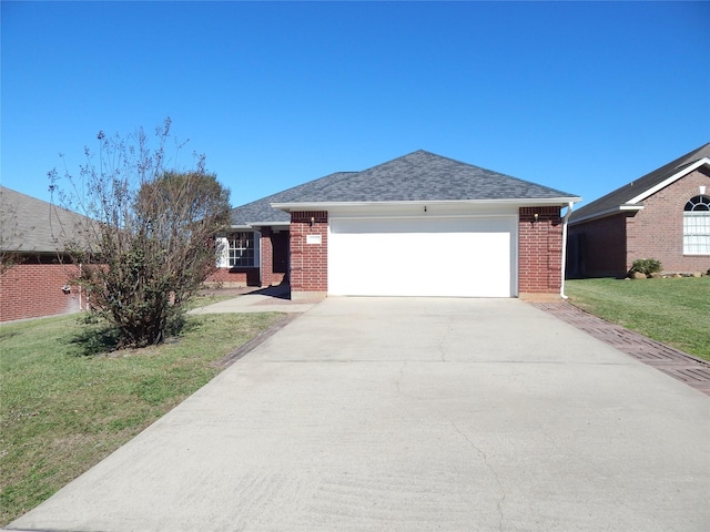 single story home with a front yard and a garage