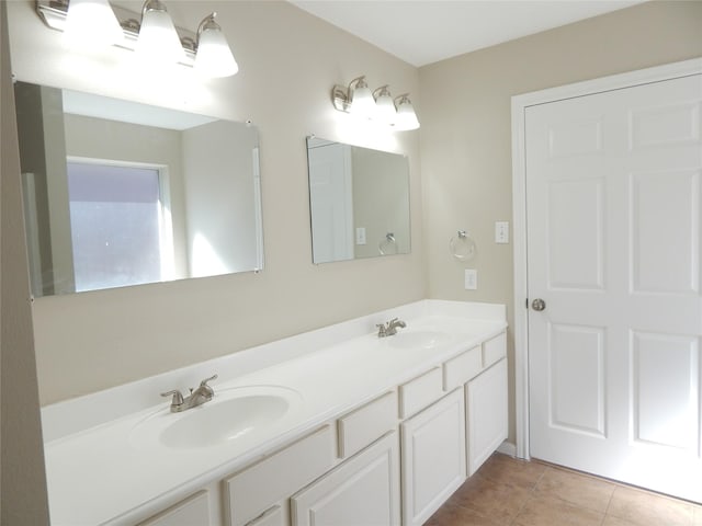 bathroom featuring tile patterned floors and vanity