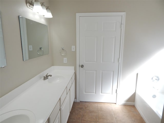 bathroom with vanity and tile patterned floors