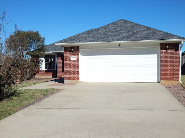 single story home with a garage