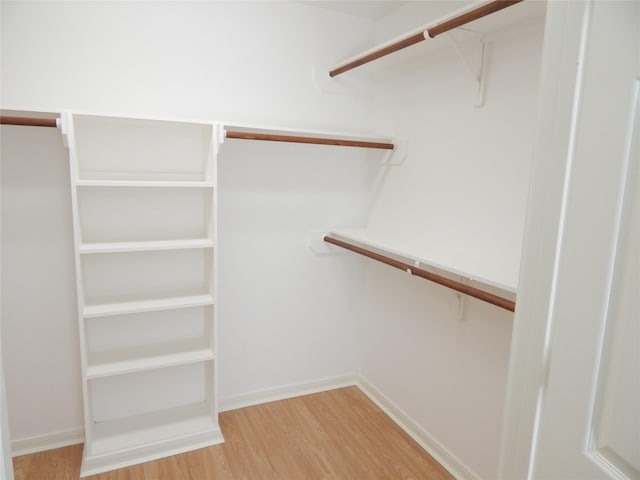 walk in closet featuring light wood-type flooring