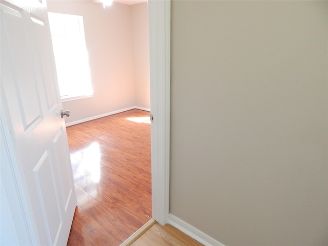 empty room with light hardwood / wood-style floors