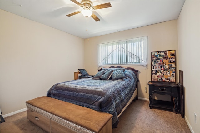 bedroom with ceiling fan and carpet floors