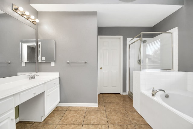 bathroom featuring tile patterned flooring, vanity, and independent shower and bath