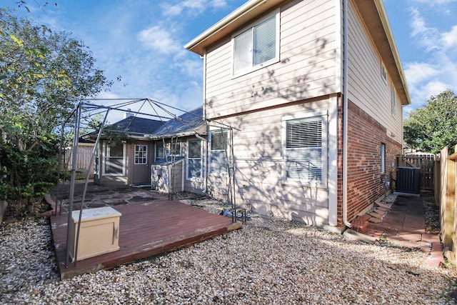 rear view of house with a deck