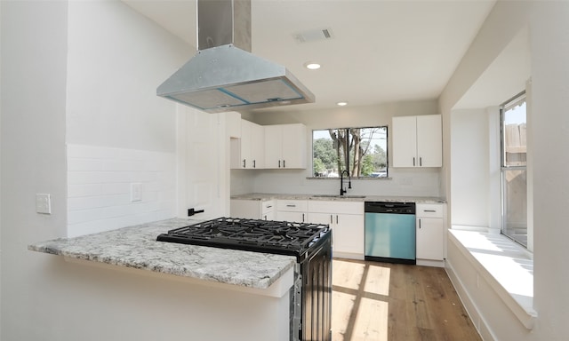 kitchen featuring white cabinetry, dishwasher, sink, kitchen peninsula, and island exhaust hood