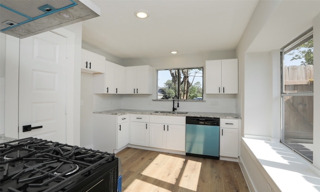 kitchen with dishwasher, sink, light hardwood / wood-style flooring, white cabinetry, and black range with gas cooktop