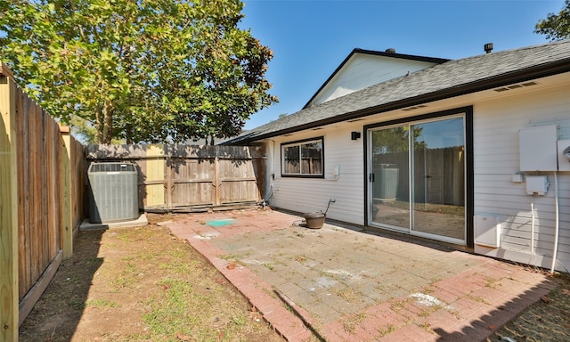 exterior space featuring cooling unit and a patio