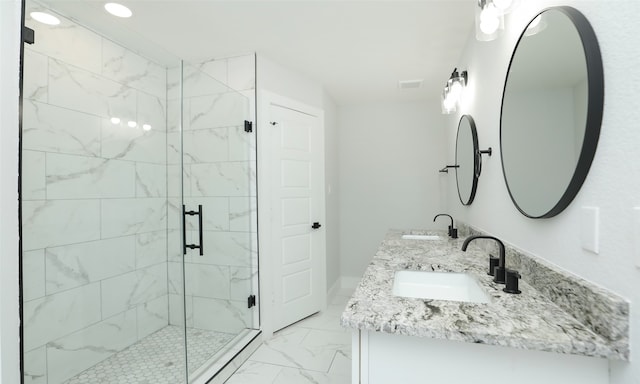 bathroom featuring vanity and walk in shower