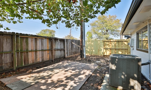 view of patio with central AC