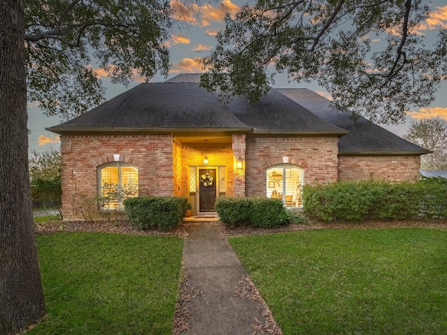 view of front of home featuring a yard