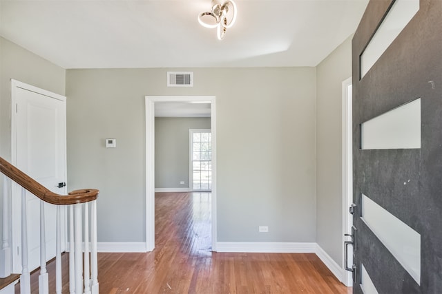 foyer featuring wood-type flooring