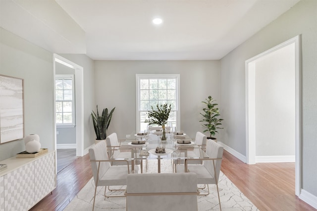 dining space featuring light hardwood / wood-style flooring