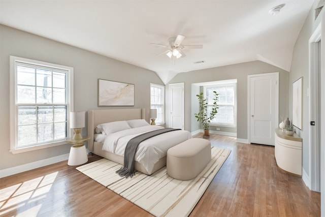 bedroom featuring hardwood / wood-style flooring and ceiling fan