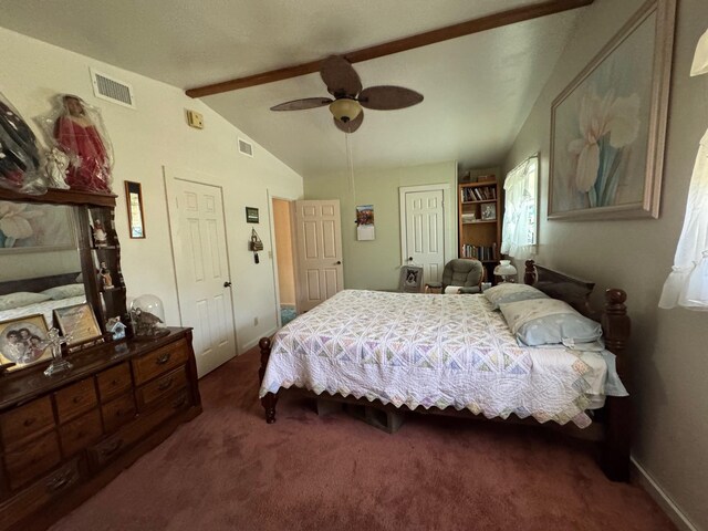 carpeted bedroom featuring ceiling fan and lofted ceiling