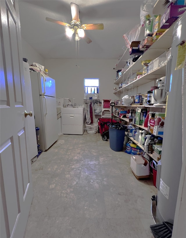 interior space featuring washer / clothes dryer and ceiling fan