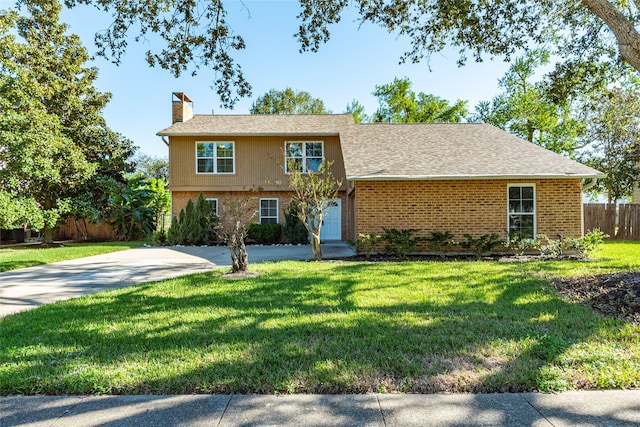 view of front of home with a front yard