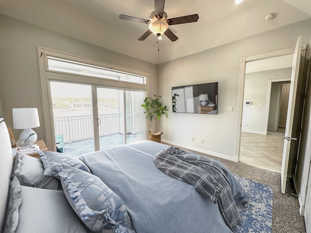 bedroom featuring access to exterior, ceiling fan, and light carpet