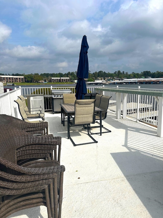 view of patio / terrace featuring a water view