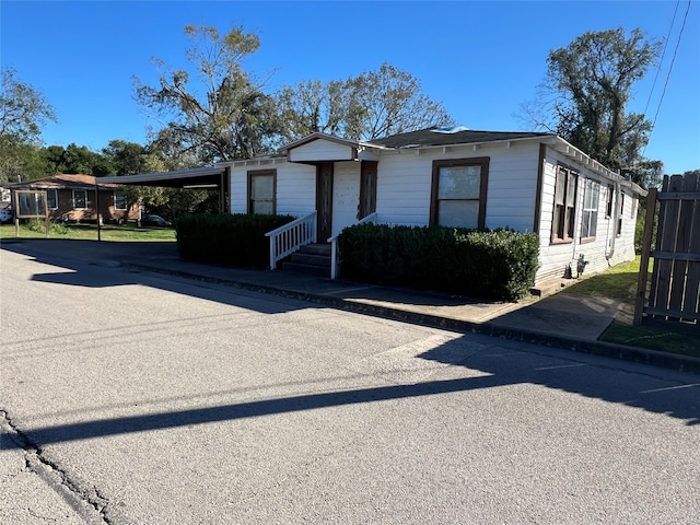 view of front of house featuring a carport