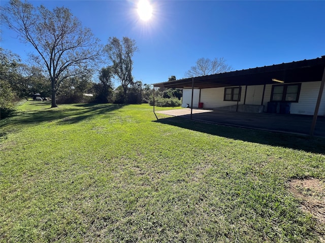 view of yard with a patio area