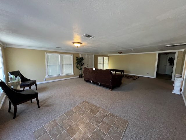 living room featuring a textured ceiling, carpet floors, and crown molding