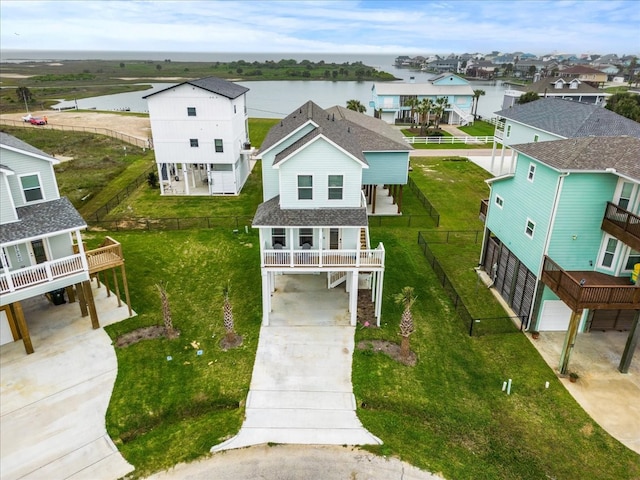 drone / aerial view featuring a water view