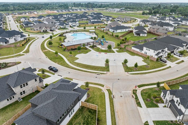 1227 Buffalo Run, Tomball, TX 77375 - aerial view of property and surrounding area featuring a pool and nearby suburban area
