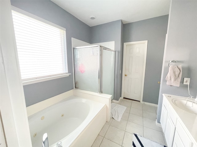 bathroom featuring separate shower and tub, tile patterned floors, and vanity