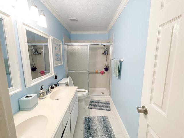 bathroom featuring a textured ceiling, tile patterned floors, a shower with shower door, and ornamental molding