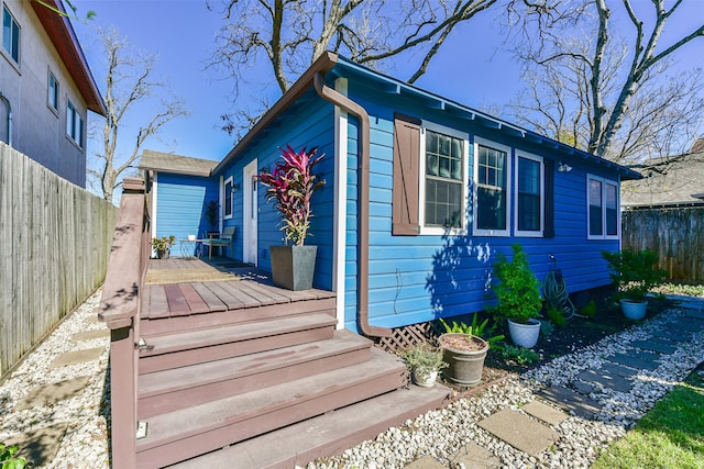 view of front of property with a wooden deck