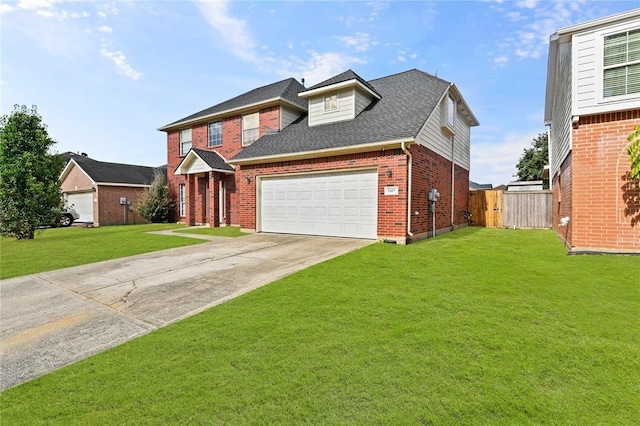 view of front of property with a front lawn and a garage