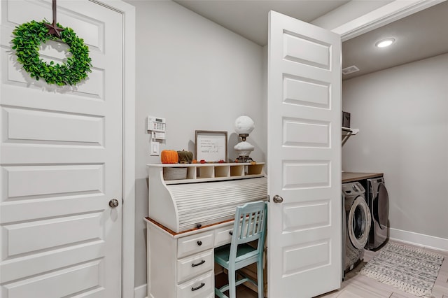 washroom with washer and clothes dryer