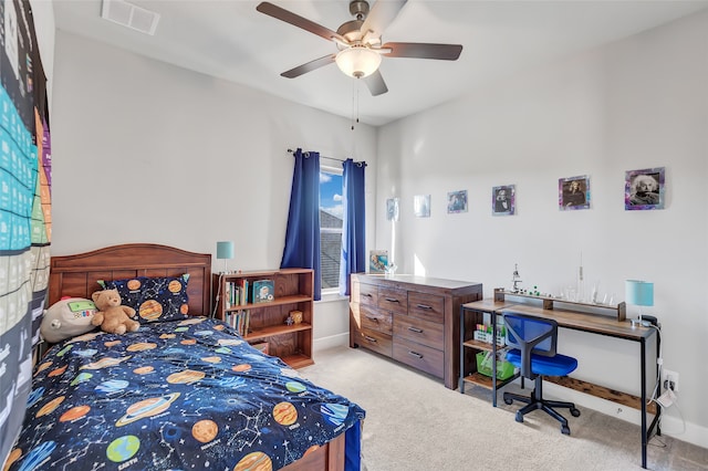 bedroom featuring ceiling fan and light colored carpet