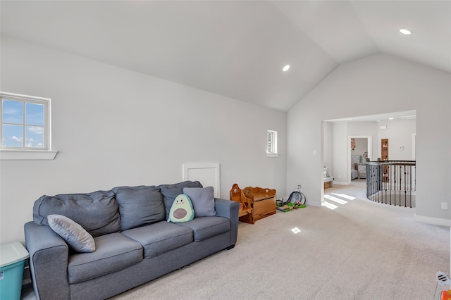 living room with carpet and lofted ceiling