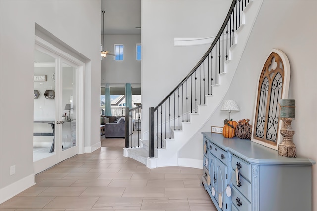 foyer featuring a high ceiling