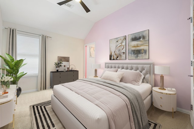 carpeted bedroom featuring ceiling fan and lofted ceiling