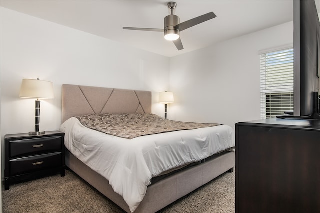 bedroom with ceiling fan and carpet floors