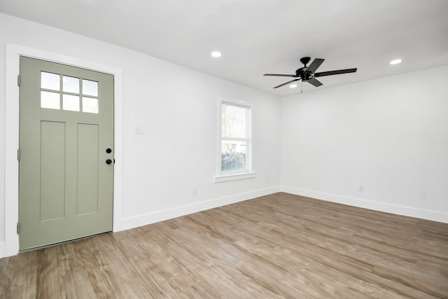 entrance foyer featuring ceiling fan and light hardwood / wood-style floors