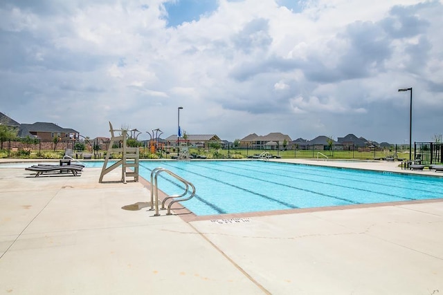 3008 Brandy Branch Ct, League City, TX 77573 - pool featuring a residential view, fence, and a patio area