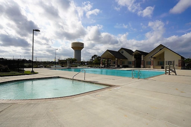 3008 Brandy Branch Ct, League City, TX 77573 - pool featuring a patio area and fence