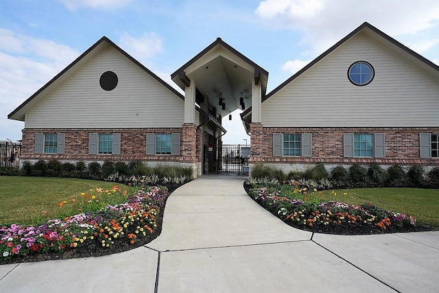 exterior space with a front lawn