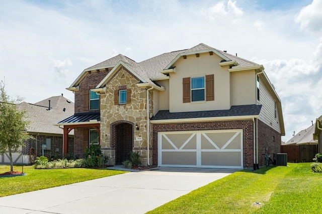 view of front of home with central AC, a garage, and a front lawn