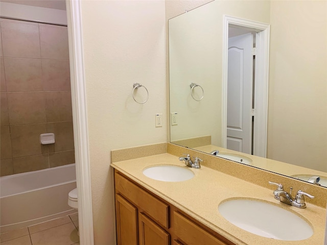 3008 Brandy Branch Ct, League City, TX 77573 - full bathroom with double vanity, toilet, tile patterned flooring, and a sink