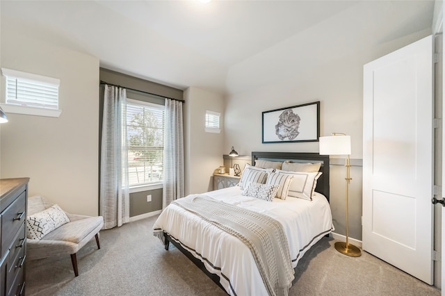 bedroom with light carpet