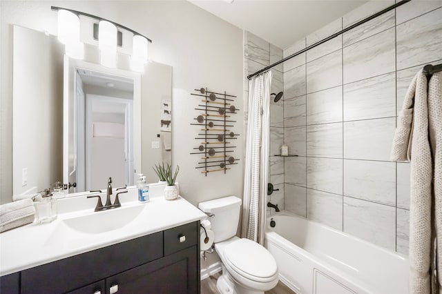 full bathroom featuring vanity, toilet, and shower / bathtub combination with curtain