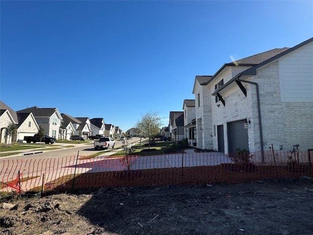 view of yard featuring a garage